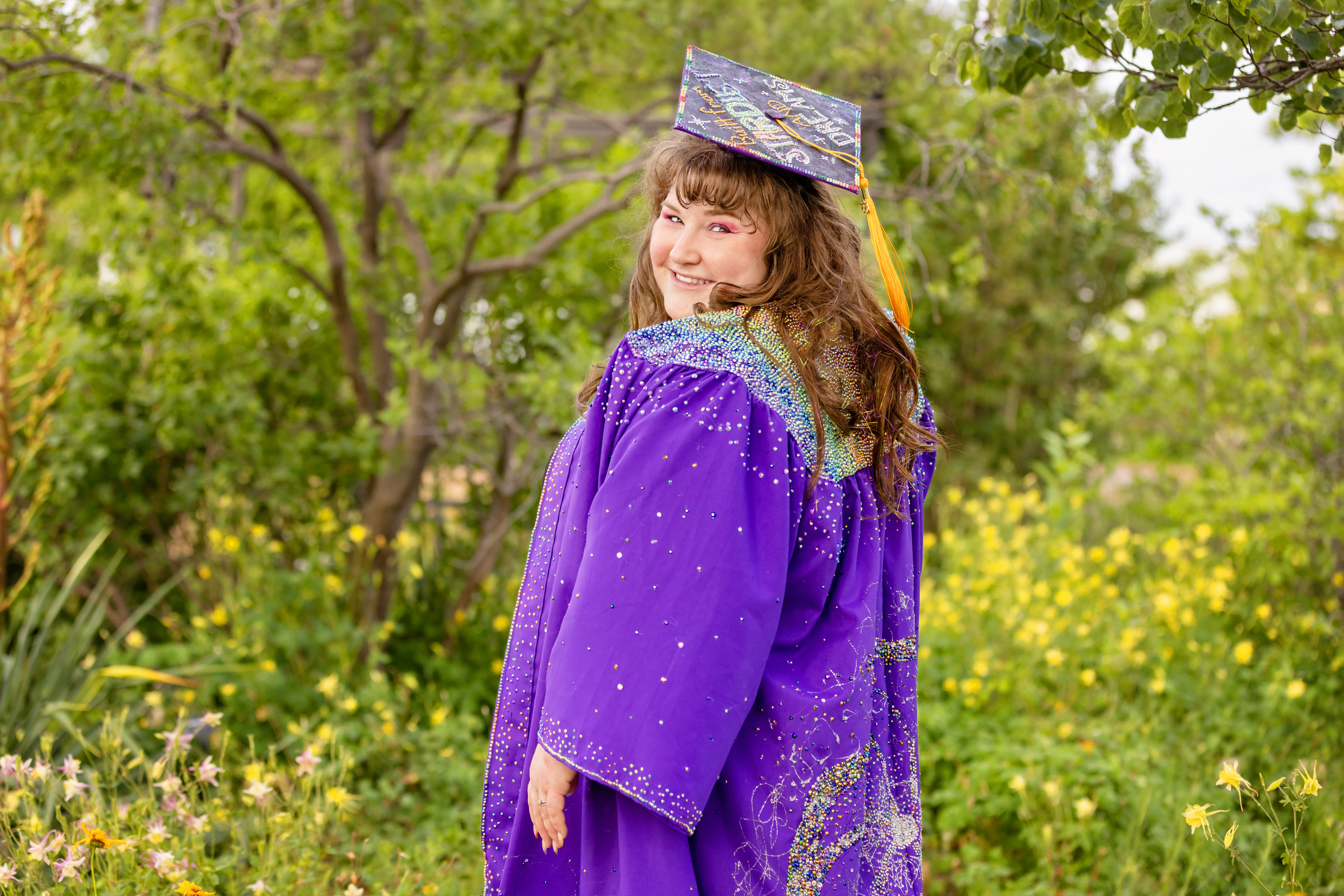 Caitlin Solis in graduation regalia